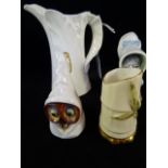 Four items of Royal Worcester, to include: a candle snuffer in the form of a hooded owl,