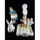 A Royal Doulton figure 'The Favourite' HN2249, together with a Lladro 'Sitting Bunny' figure no.