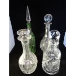 A collection of four decanters of various form, each with original stoppers, the tallest 37cm.
