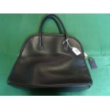 A ladies Coach black leather handbag, ha