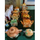 A collection of ten Cottageware teapots,