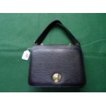 A ladies Chloe small black leather handb