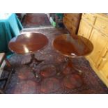 A pair of reproduction mahogany occasional tables, 58cm diameter.