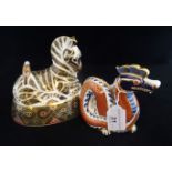 A Royal Crown Derby zebra paperweight with gold stopper,