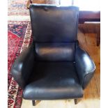 A late 20th century ercol-style lounge chair upholstered in black simulated lether, 75cm wide.