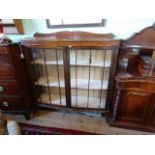 A large mid-20th century display cabinet, 118cm wide.