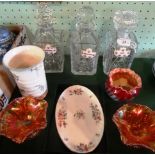 Three cut glass decanters, each with ceramic spirit labels, made by Royal Adderley,