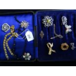 A quantity of costume jewellery, to include: an enamelled brooch in the form of a butterfly,