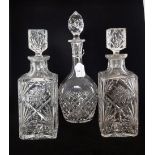 A pair of square form cut glass decanters with stoppers (28cm),