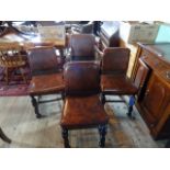 A set of six 19th century oak country chairs, having rush seats, splat back on front hoof supports,