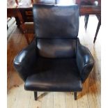 A late 20th century ercol-style lounge chair upholstered in black simulated lether, 75cm wide.