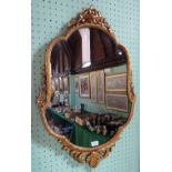 A reproduction French -style wall mirror in gilt frame, glass 58cm x 46cm.