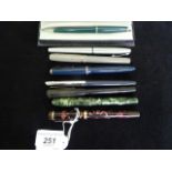 A Conway Stewart 75 fountain pen in green marbled case, lever fill mechanism, 14ct gold nib,