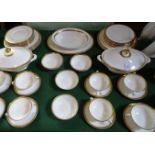 A Royal Doulton Royal Gold dinner service, no. H4980, a six place setting with extras comprising: