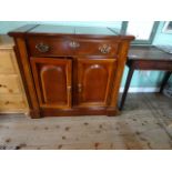 A reproduction mahogany serving cabinet,