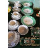 A quantity of 19th century florally decorated plates with matching comport,