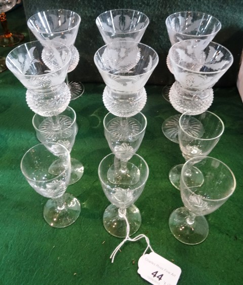 A set of six Edinburgh crystal wine glasses, having acid etched thistle decoration over cut glass