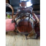 A late 19th century mahogany swivel smokers bow chair, united by X-stretcher. Condition Report: Lots