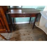 A 19th century oak single drawer side table on chamffered supports, 91cm wide.