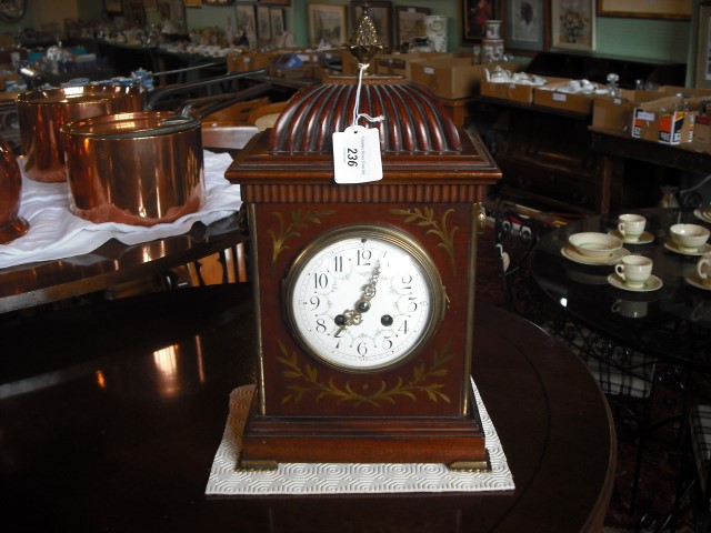 A late 19th/early 20th century mahogany and brass inlaid bracket clock,