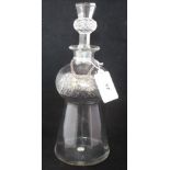 A thistle shaped glass decanter, having conforming stopper and white metal 'whisky' decanter label,