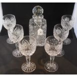 An Edinburgh crystal cut glass decanter of square form, together with six conforming wine glasses.