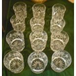 Two sets of six cut glass whisky tumblers, each set with similar decoration, 8.5cm and 8cm tall.