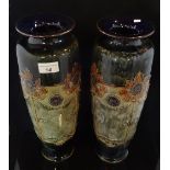 A pair of early 20th century Royal Doulton stoneware tall vases,