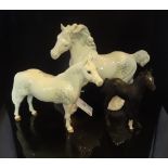 A Beswick Cantering Shire horse, no. 895 (grey), together with a Beswick Connemara pony, no. 1641 (