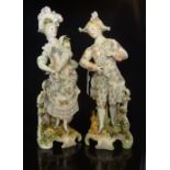 A pair of large 19th century Continental ceramic figurines,