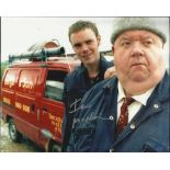 Ian Mcneice signed colour 10x8 photo from Doc Martin, seen here as his character Bert Large. Good