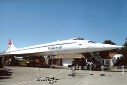 CONCORDE WORLD RECORD: 8x12 inch photo, a view of Concorde standing at rest, signed by Concorde