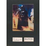 Dave Prowse and James Earl Jones separate signature pieces matted underneath a photograph of Darth