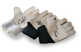 Football Autographed Goalkeeping gloves collection. Three unidentified autographed football