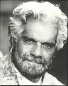 Stunning black and white 8x10 portrait photograph autographed by legendary actor Omar Sharif, the