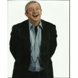 Louie Walsh the X-Factor judge signed laughing 10 x 8 colour 3/4 length portrait photo. Good