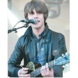 Jake Bugg 8x10 colour photo of Jake, signed by him in NYC, April, 2013. Good condition