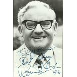 Ronnie Barker signed 6 x 4 b/w portrait photo, relaxed smiling pose, To Graeme. Good condition