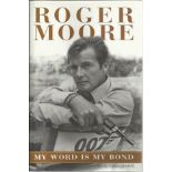 Roger Moore signed hardback book My World is My Bond. Good condition