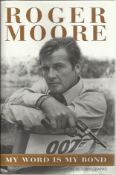 Roger Moore signed hardback book My World is My Bond. Good condition