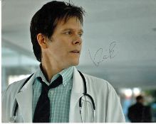 Kevin Bacon 10x8 colour photo of Kevin, star of Footloose, signed by him in NYC. Good condition