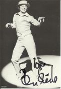 Tommy Steele signed 6 x 4 b/w photo dancing. Good condition