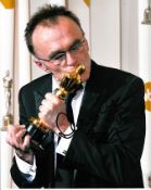 Danny Boyle 8x10 colour photo of Danny holding his Oscar, signed by him in London. Good condition