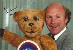 Roger De Courcey With Nookie Bear In Person Signed 12x8 photo. Good condition