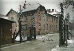 Iby Knill holocaust survivor personally signed Auschwitz entrance gates 12x8 photo. Good condition