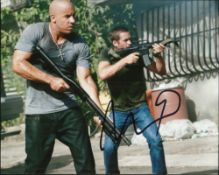 Vin Diesel signed 10 x 8 colour action photo from Fast & Furious. Good condition
