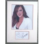 Michelle Ryan mounted autograph. Undedicated autograph in the hand of actress Michelle Ryan who