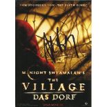 Joaquin Phoenix signed colour postcard for The Village. Good condition