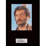 Eli Wallach. Signature with picture from ‘Good, Bad, Ugly.’ Professionally mounted in black to 16”