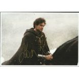 Ioan Gruffudd signed 10 x 8 colour photo from King Arthur on Horseback. Good condition